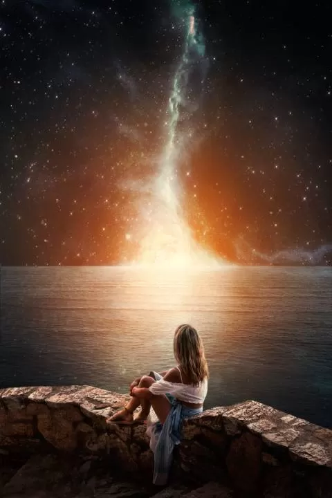 full-shot-woman-sitting-rocks-universe-energytuneup_net
